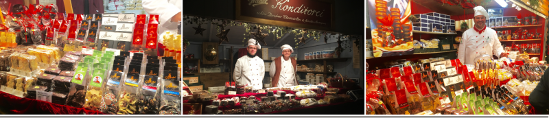 Konditoren am Weihnachtsmarktstand der Konditorei Gradel mit Stollen und Süßwaren